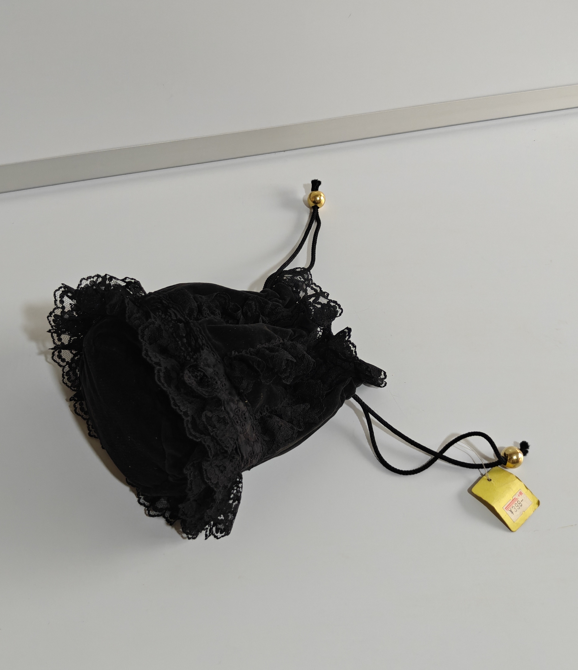 Black Lace Drawstring Pouch with Gold Bead Accents