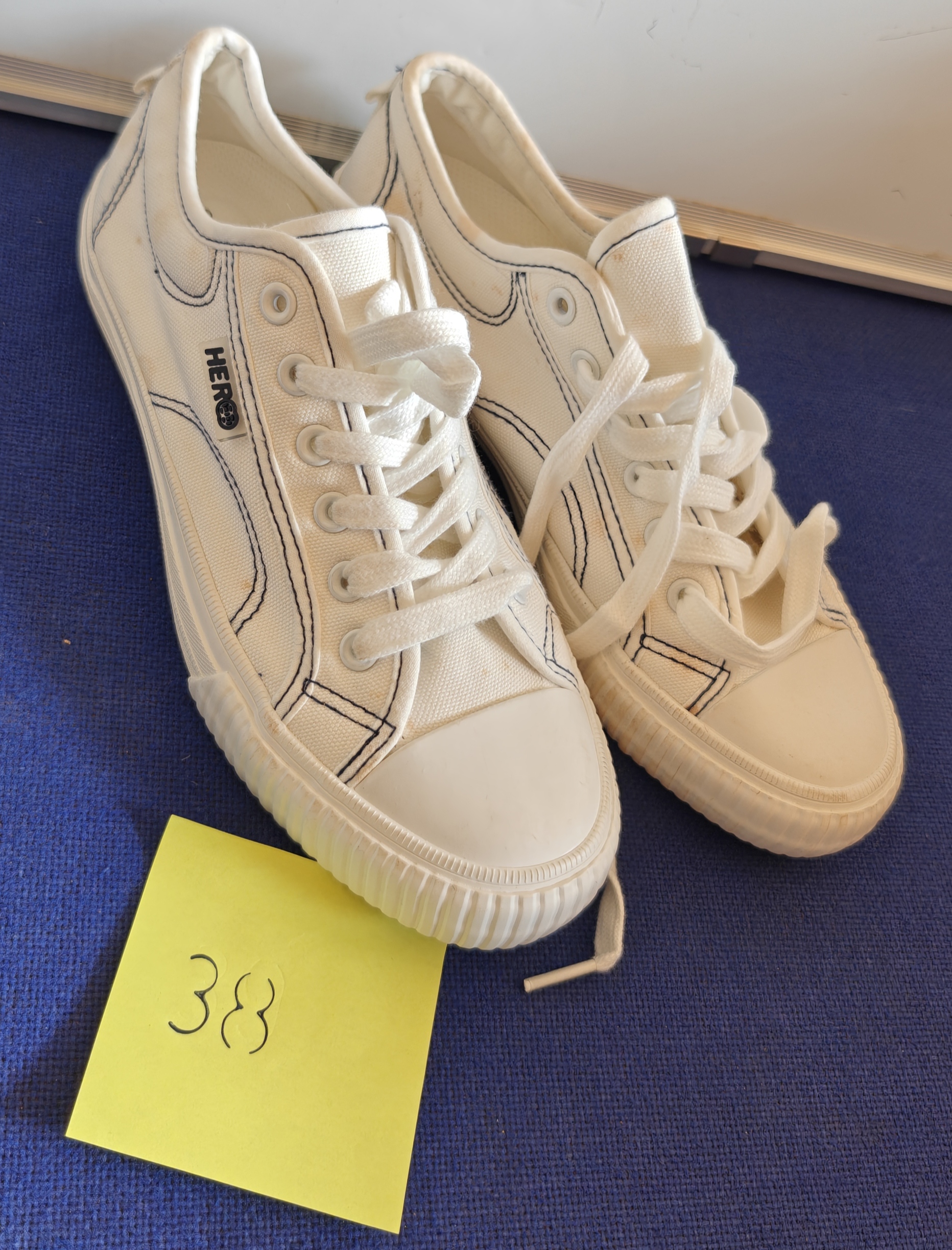 HERCO White Canvas Sneakers with Black Stripe Design