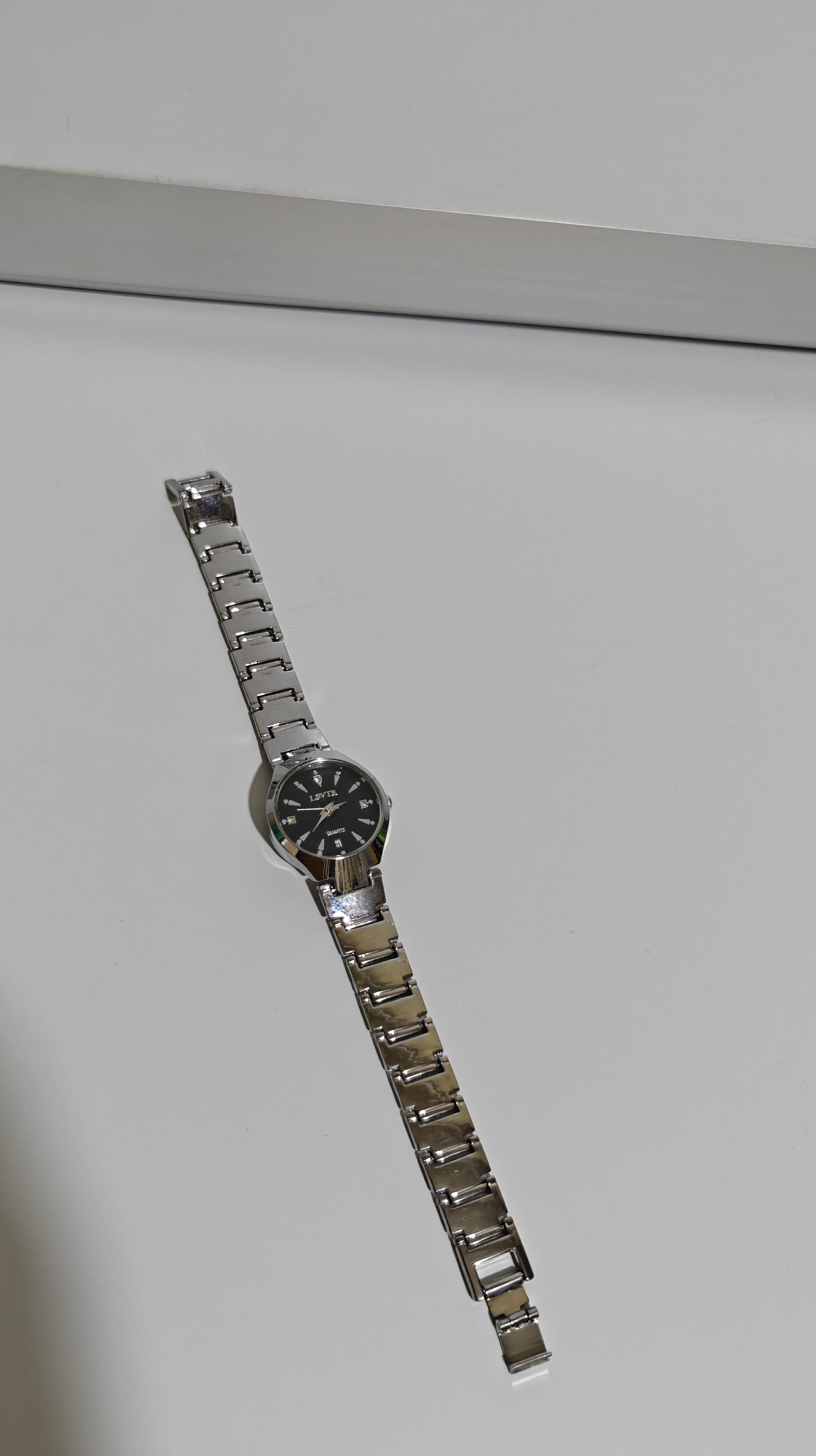 Stainless Steel Analog Wristwatch with Black Dial