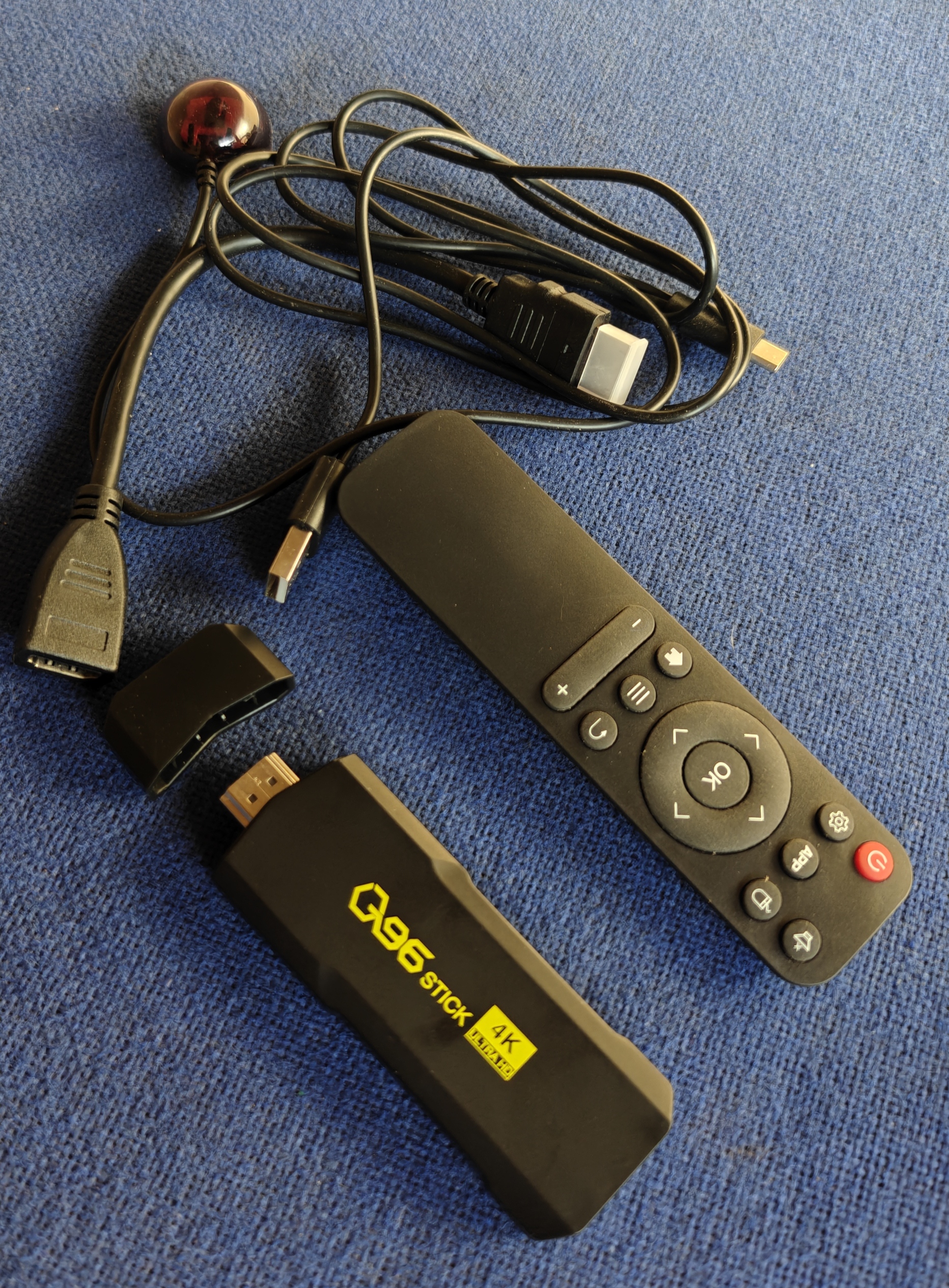 Q96 4K ANDROID TV STICK WITH REMOTE – UGX 70,000