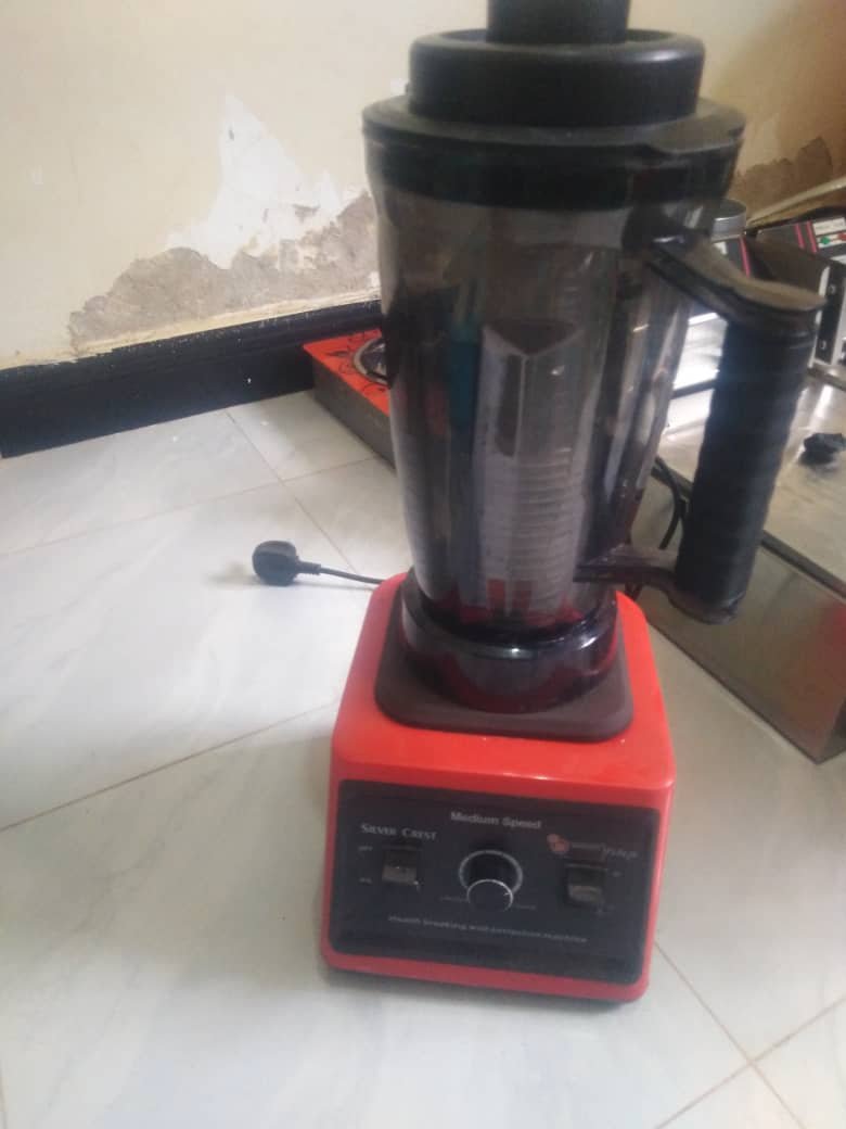 Red High-Power Blender with Black Pitcher - Medium Speed