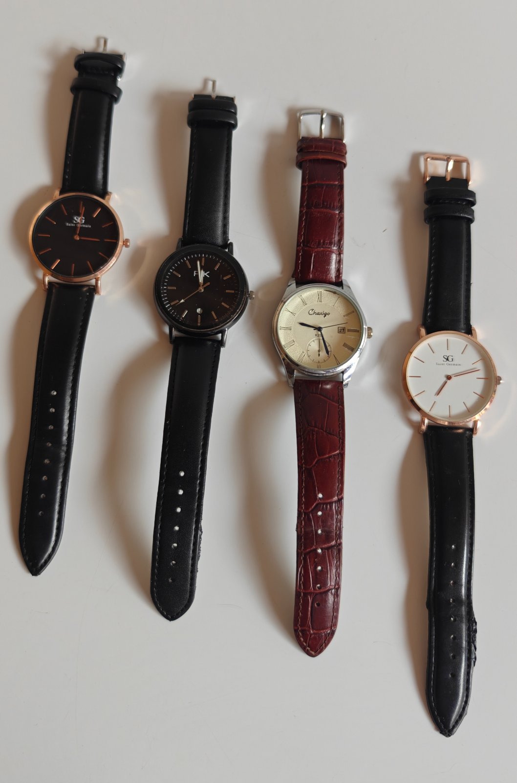 Lot of 4 Stylish Leather Strap Watches