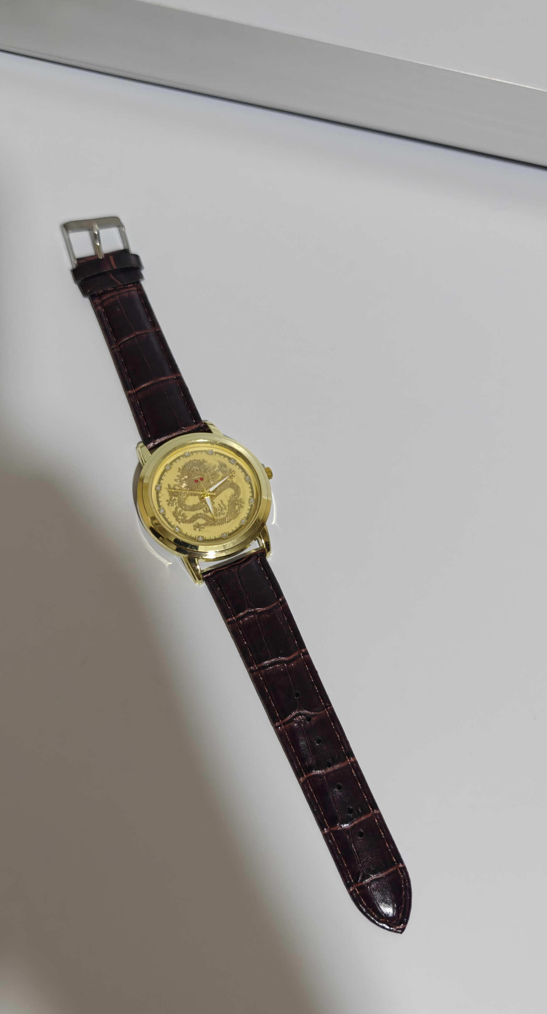 Gold Tone Skeleton Automatic Watch with Brown Leather Strap